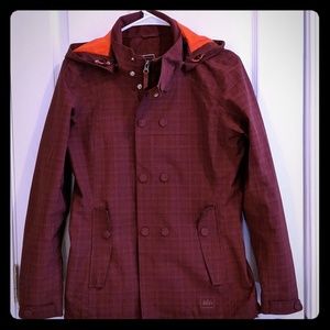 REI rain jacket stylized as a peacoat